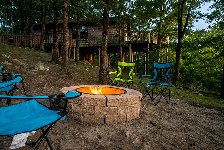 Enjoy the Fire pit outside your sunset mountain cabin rental in oklahoma