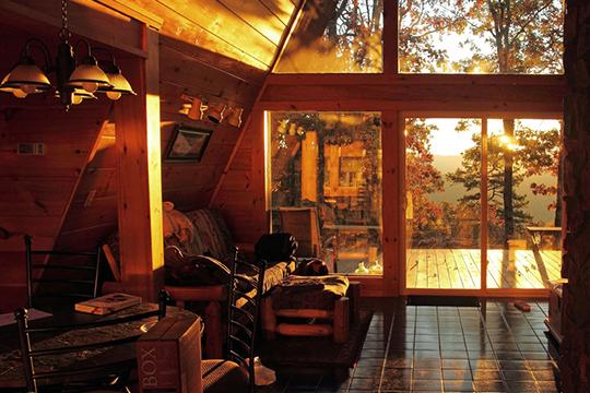 Rays from the morning sun filtering into your mountain cabin rental